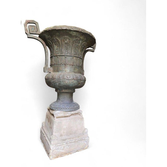 "pair of antique bronze garden vases – 19th century" an imposing pair of palatial bronze garden vases, mounted on solid...