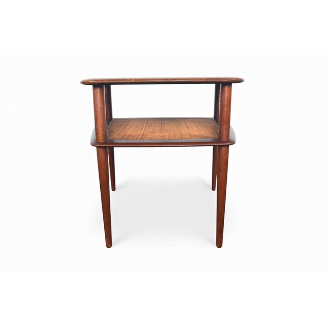 Origin: Denmark Designer: Peter Hvidt + Orla Molgaard Nielsen Manufacturer: France + Daverkosen Era: 1950s Materials:...