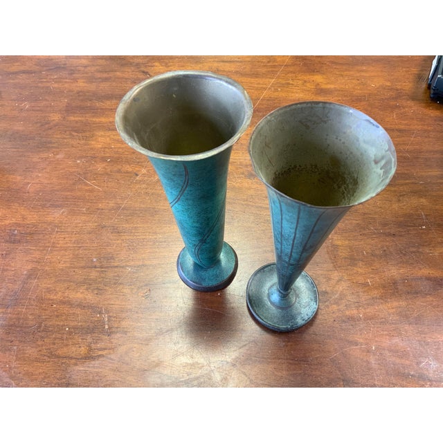 20th century Art Deco Verdigris metal vases. Beautiful design detail, lines and patina. Shorter vase measures 3.5” x 8.5”