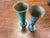 20th century Art Deco Verdigris metal vases. Beautiful design detail, lines and patina. Shorter vase measures 3.5” x 8.5”