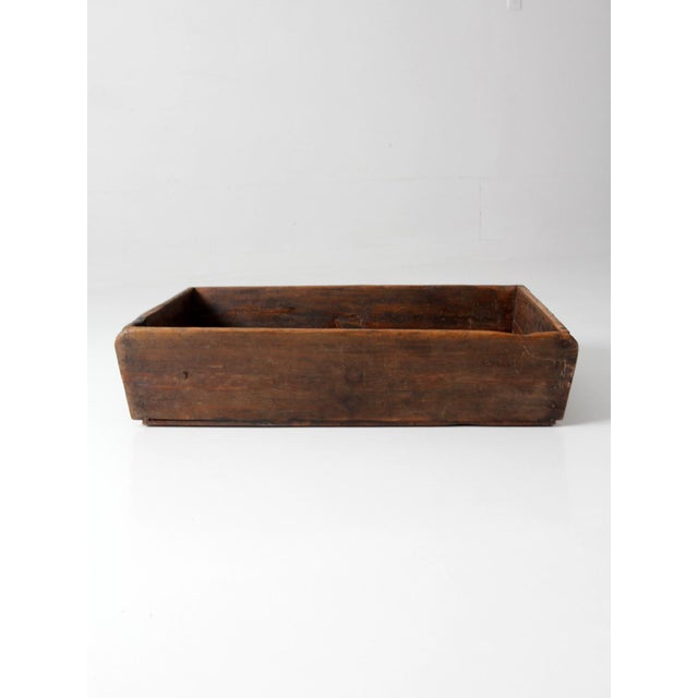 Dating to the 1800s, this primitive wood dough tray showcases a beautifully timeworn character, with a broad rectangular...