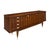 Buffet from the mid-century period in France. This piece is made of solid wood construction and features a striking...