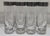 A handsome set of eight vintage highball glasses with silver overlay-style scroll rims, needle-etched floral decoration,...