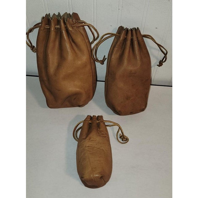 This collection of leather marble bags or could be for valuable Jewelry .Could also be for gold or silver. Great look with...