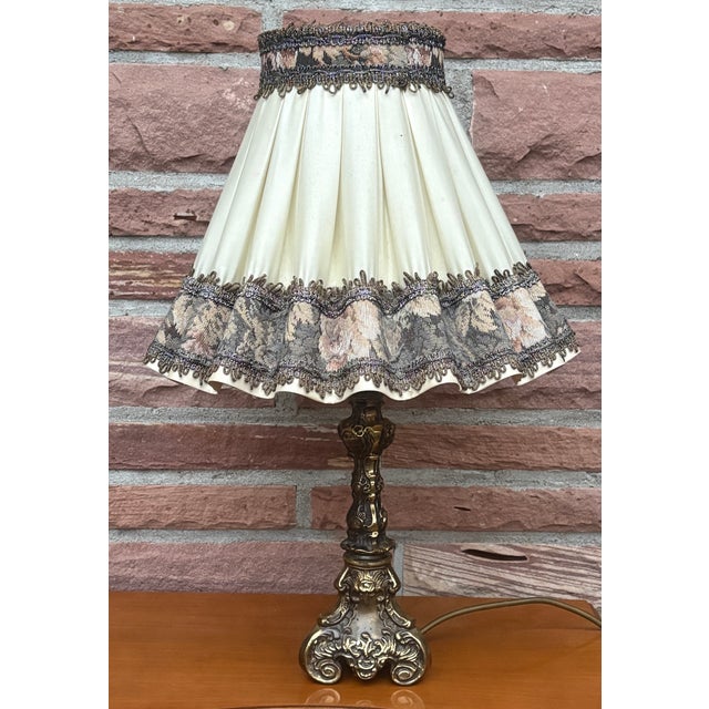 Vintage Empire Table Lamp in Brass with Fabric Shade, 1960s, in Very Good conditions. Designed 1960 to 1969 I have...
