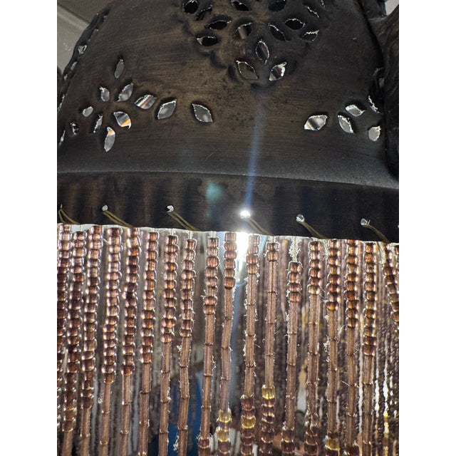 Make a dramatic statement with this extraordinary Moorish Revival multi-light chandelier featuring an intricate pierced...