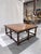 A substantial American-made cocktail table from Woodland Furniture’s Grayson collection, crafted with a richly figured...