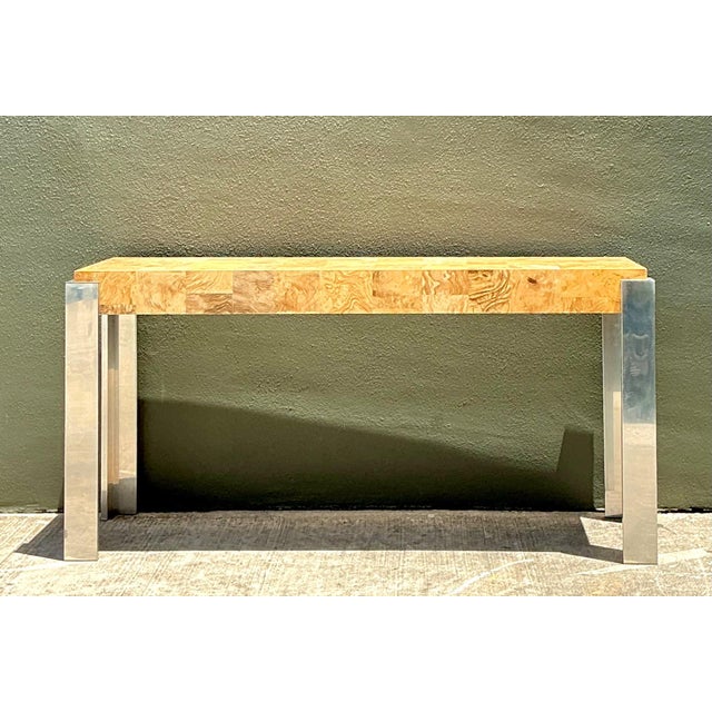 This vintage console table is a refined expression of mid-century modern design, pairing organic warmth with sleek...
