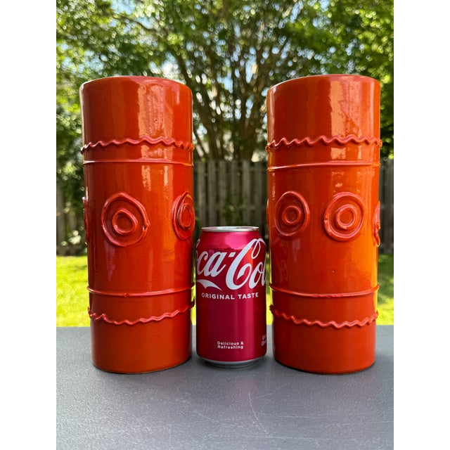 Offering for sale this lovely pair of vintage ceramic cylindrical vases with the following features: - Handmade in Italy...