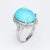 Stylish egg shell blue turquoise & diamond cocktail ring crafted in 900 platinum. Turquoise cabochon measures 18mm x 13mm...