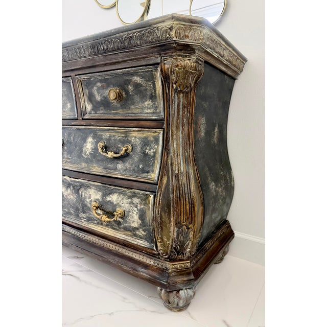 A vintage Lane bombe chest, completely reimagined and hand-refinished by artist Martine Moser at her Maison Martine studio...