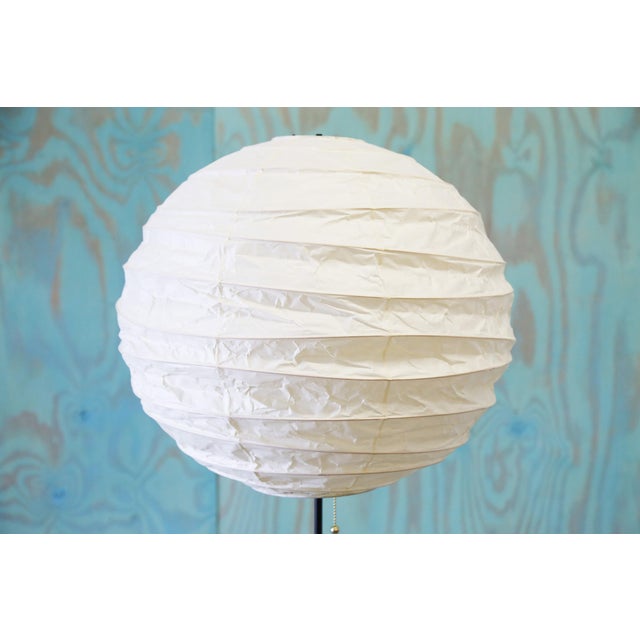 An original 1950s BB3 floor lamp by Isamu Noguchi. The original shade was torn, and thus updated with a new harp, and new...