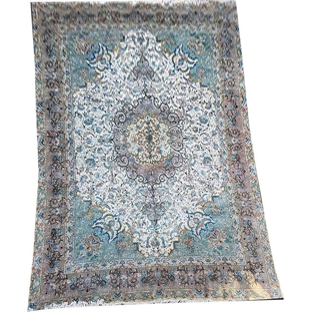 Wow, this is too good to be truth. This is a genuine wool & silk Persian Tabriz that fits in high quality rugs because of...