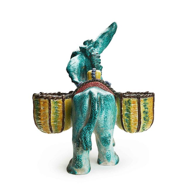 A large ceramic donkey with egg baskets, Perugia, 1950, used by the confectionery industry for luxury Easter egg...