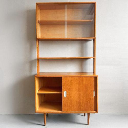 Vintage mid-century Danish design wall unit designed by J. Jiroutek in the 1960s. This wall unit features a display case...