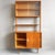 Vintage mid-century Danish design wall unit designed by J. Jiroutek in the 1960s. This wall unit features a display case...