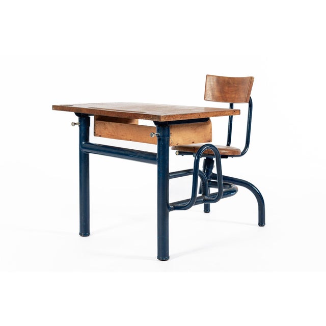 This rare vintage industrial-style mid century school desk in the style of Jean Prouvé is circa 1940. This single-seater...