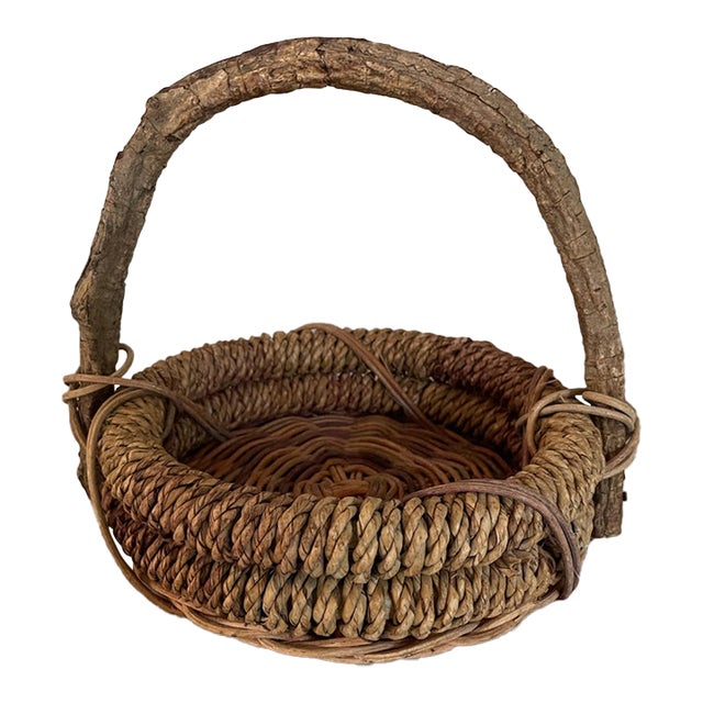 Vintage Rustic Woven Basket With Branch Handle For Sale