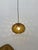 Limburg Glashütte hanging lamp with a great light effect once lit. Warm amber colored glass with golden holder. In good...