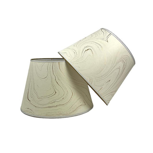 Marbled paper with an airy cream and gold pattern. Trimmed with two color of grossgrain. Available in 3 sizes: 8” x 12” x...