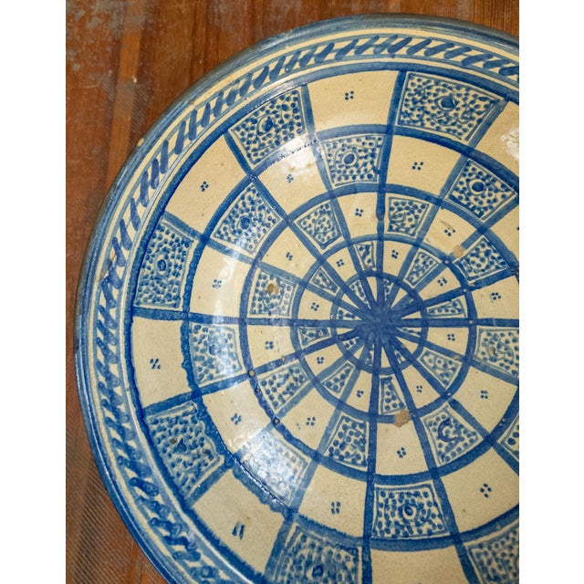 We are selling blue and white rustic Moroccan large pottery bowl. This bowl could be used as a centerpiece but is wired to...