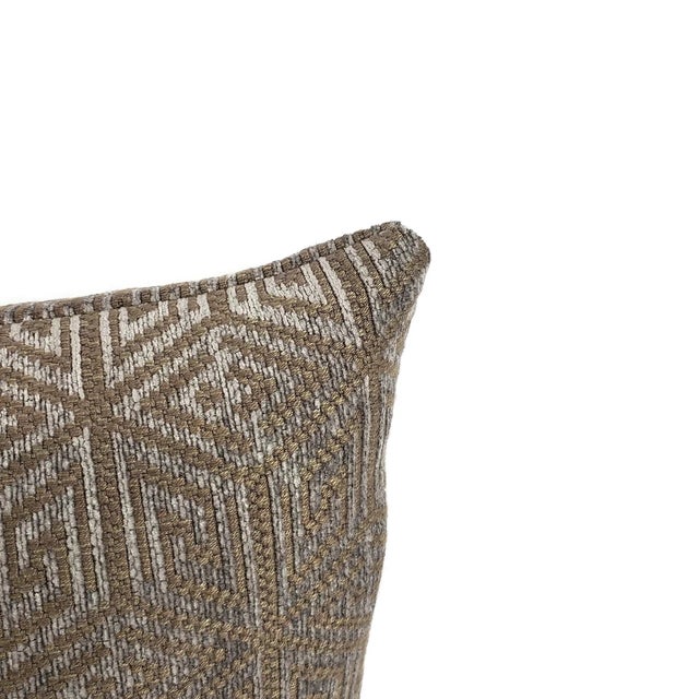 From F. Schumacher is COSMATI CHENILLE in the color smoke. A sophisticated geometric pattern in shades of gray and brown....