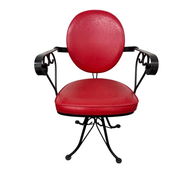 Add a bold dose of vintage glamour to your dining space with this striking circa 1970s Hollywood Regency dinette set. The...