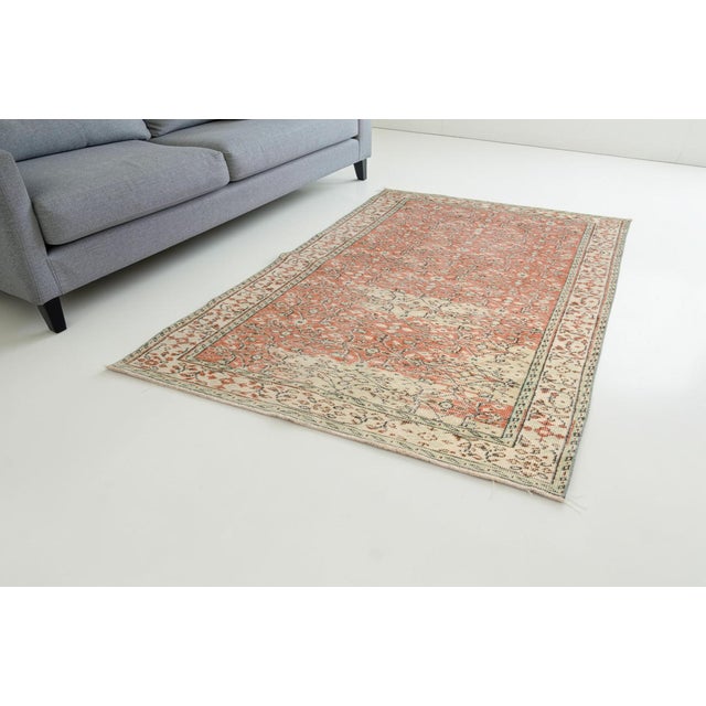 Bring timeless elegance to your space with this beautiful, handwoven vintage Turkish area rug. Featuring a sophisticated...