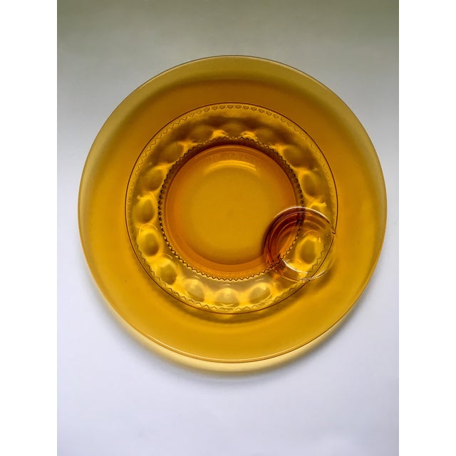 A vintage amber glass snack plate made in the “Crown” pattern. Ships within 1-2 days using USPS. All items packed with...