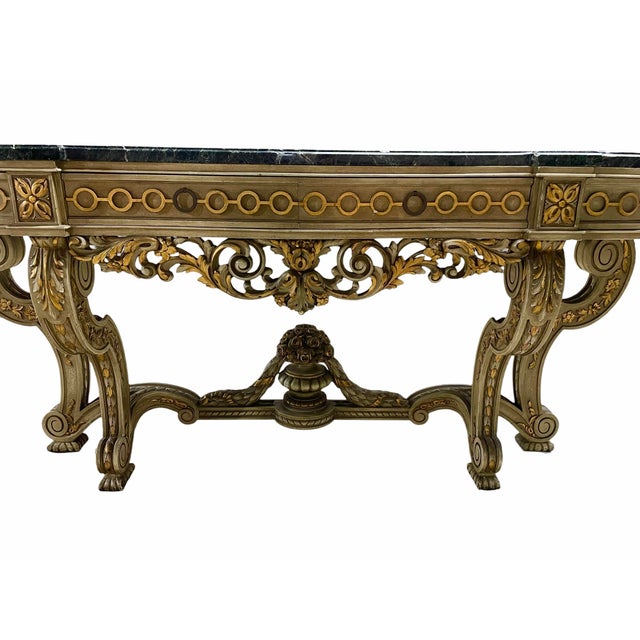 Stunning antique carved marble console table in the style of classic Italian and French luxury furniture. This ornate...