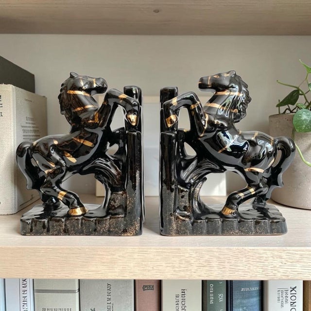 Elevate your home decor with these exquisite 1950s Black Ceramic Horse Bookends, a perfect blend of elegance and...