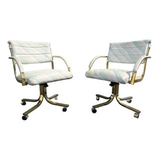 A Pair of Early 1990s Post Modern Brass Rolling Dining Chairs by Cal-Style Furniture. For Sale