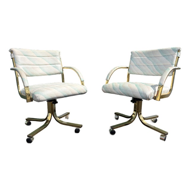 A Pair of Early 1990s Post Modern Brass Rolling Dining Chairs by Cal-Style Furniture. For Sale