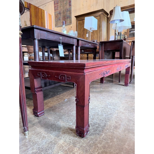 A richly crafted vintage Ming style coffee table featuring elegant Asian inspired lines and a beautifully figured burl...