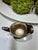 The base of this vintage silver-plated hollowware piece is stamped with the hallmark for the International Silver Company...