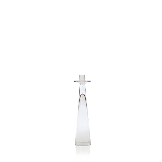 This sleek and stylish candle stand adds an elegant panache to the party decor. Features include unique modern shape of...