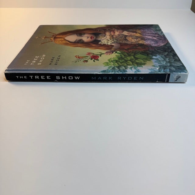 A rare and highly collectible signed first edition of The Tree Show by acclaimed pop-surrealist artist Mark Ryden....