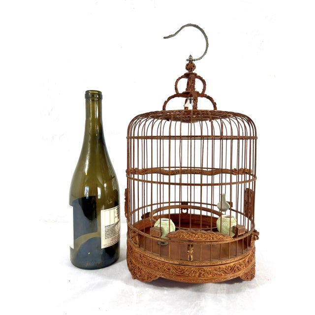 A superior handmade Chinese bamboo birdcage with 3 lovely celadon bird feeders for a small bird and a double dragon perch!...