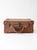 This vintage miniature leather suitcase brings the charm of early travel into the home. Wrapped in warm brown leather with...