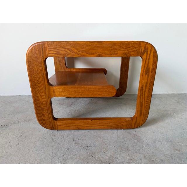 Designed by Lou Hodges, this 1970s Mid-Century Modern side table showcases the designer’s signature California modern...