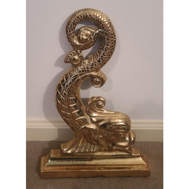 Pair of Mid 20th Century Virginia Metalcrafters Dolphin Brass Fireplace