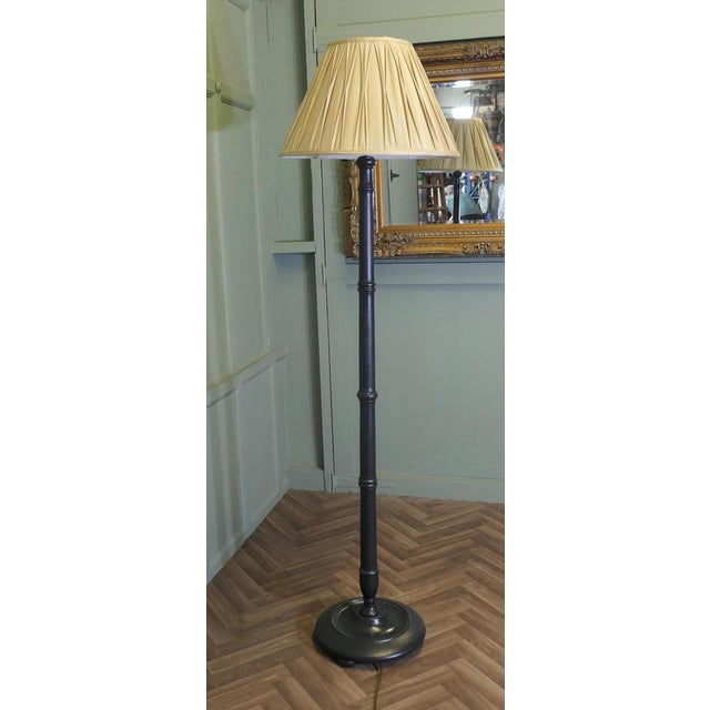 Simulated Bamboo Floor Lamp A very attractive piece, the base of the lamp is turned and it has a chunky black column...