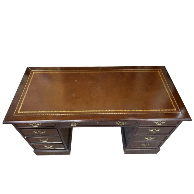 Vintage executive pedestal desk by Sligh Furniture. American craftsmanship inspired by classic English design. Mahogany...