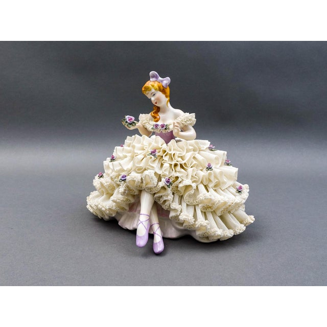 Antique Dresden Germany Large Sitting Ballerina Dancer Lady Holding Flower Porcelain Lace Figurine. Measures approximately...