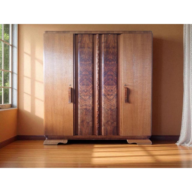 This exceptional wardrobe was crafted in Germany between the late 1930s and early 1950s and embodies the transition from...