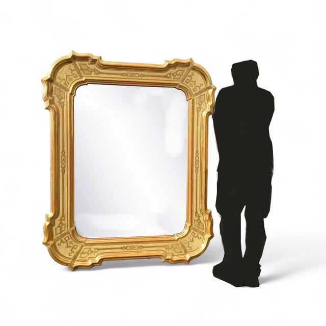 Very large rectangular mirror in gilded wood Italian work from the mid-19th century, with some scattered chips, losses,...
