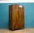 An Art Deco walnut wardrobe - circa 1930's - Fitted out with a clothes rail and shelf