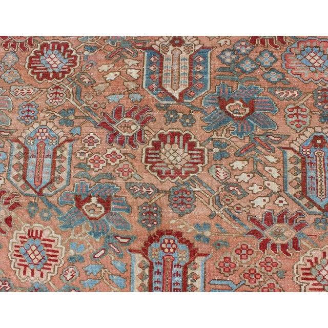 Salmon Antique Persian Bakhtiari Rug Featuring Repeating Floral Motifs and Rich Red 10 X 12 For Sale - Image 8 of 12