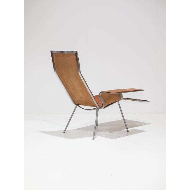 A very rare lounge chair—model leather lounge chair 04 (ll04)—designed in 2004 by the belgian designer maarten van severen...