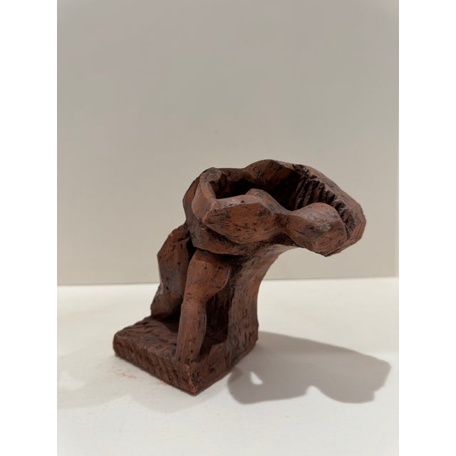 Larry Mohr (American, 1921-2013) abstract terracotta sculpture with elongated biomorphic form. Mohr was an accomplished...